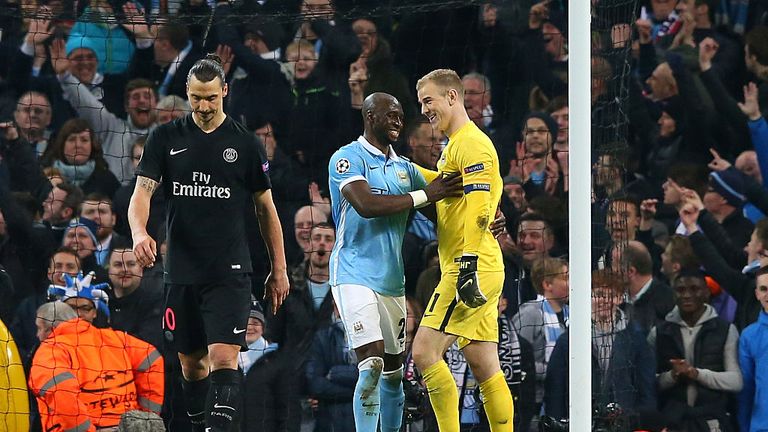 Eliaquim Mangala and Joe Hart of Manchester City react as Zlatan Ibrahimovic of Paris Saint-Germain has a goal disallowed during the match