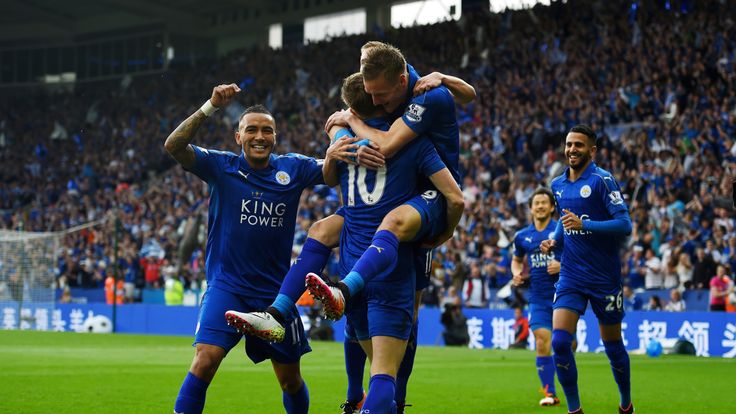 Jamie Vardy (3rd L) celebrates after scoring champions Leicester's opener against Everton