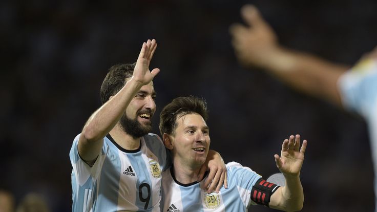 Argentina's Gonzalo Higuain (L) and Lionel Messi celebrate