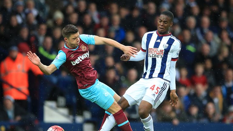 West Ham United's Aaron Cresswell (left) and West Bromwich Albion's Jonathan Leko battle for the ball during the Barclays Premier League match at The Hawth