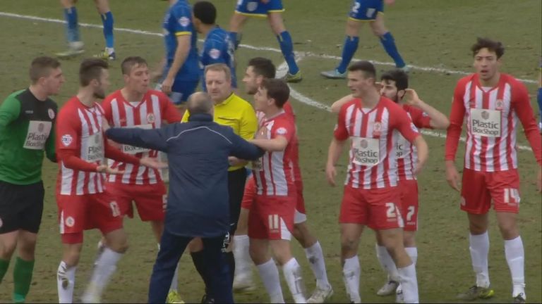 Accrington players protest after disallowed goal