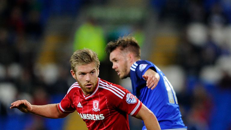 CARDIFF, WALES - OCTOBER 20: Adam Clayton of Middlesbrough looks to break past Craig Noone of Cardiff City during the Sky Bet Championship match between Ca
