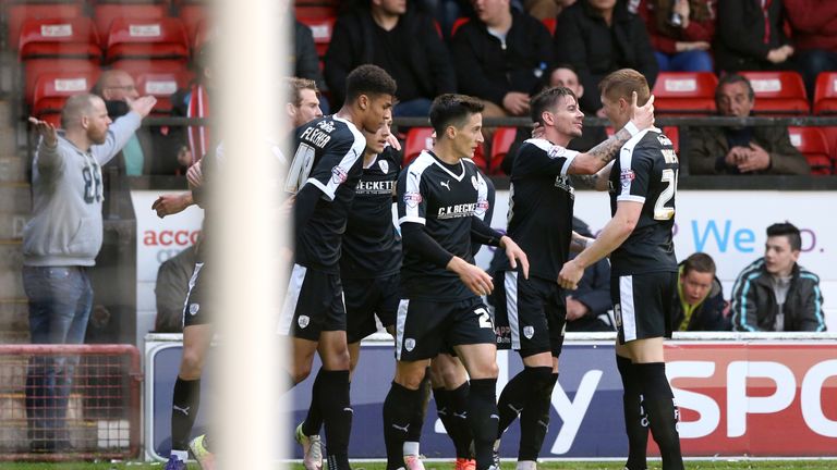 Barnsley's Adam Hammill (second right) celebrates scoring his side's first goal of the game at Walsall, Sky Bet League One play-off semi-final second leg