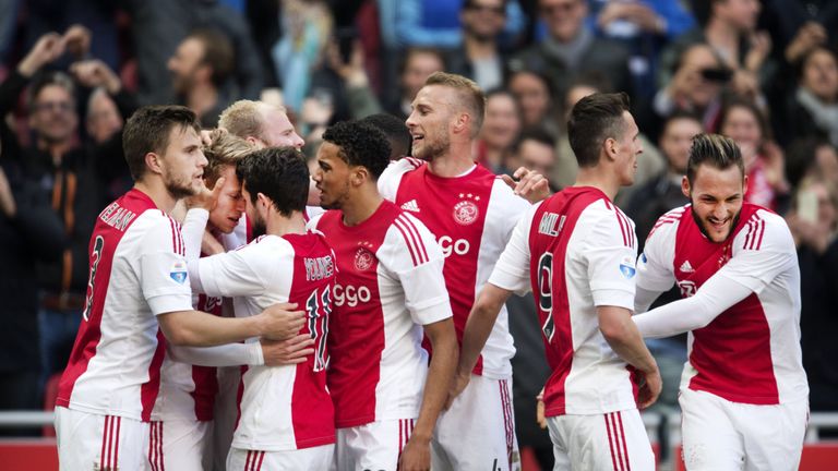 Ajax Amsterdam players celebrate after scoring a goal during the Dutch first league football match against FC Twente in Amsterdam, on May 1 2016. A / AFP /