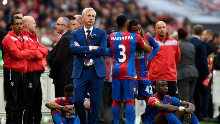 Alan Pardew manager of Crystal Palace looks dejected