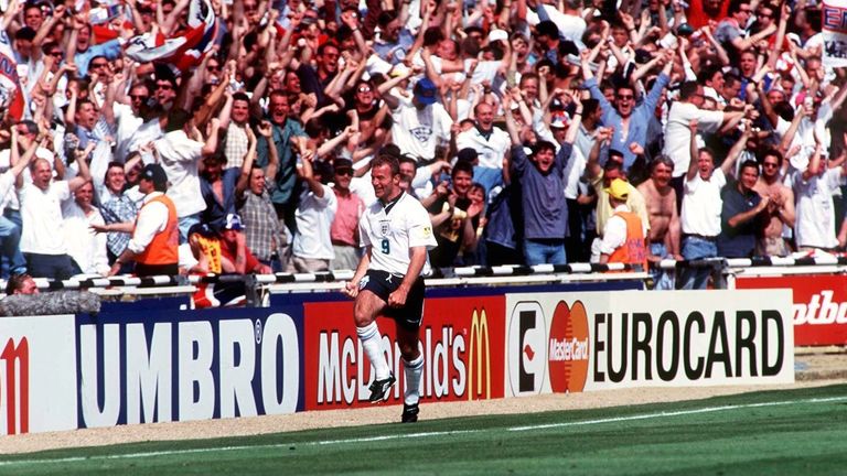 Alan Shearer celebrates in front of the England fans at Wembley