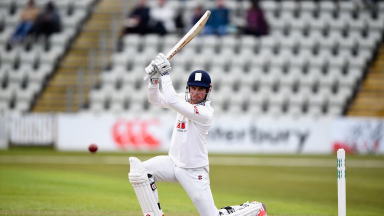WORCESTER, ENGLAND - MAY 02:  Essex batsman Alastair Cook drives to the boundary during day two of the Specsavers County Championship Division Two match be