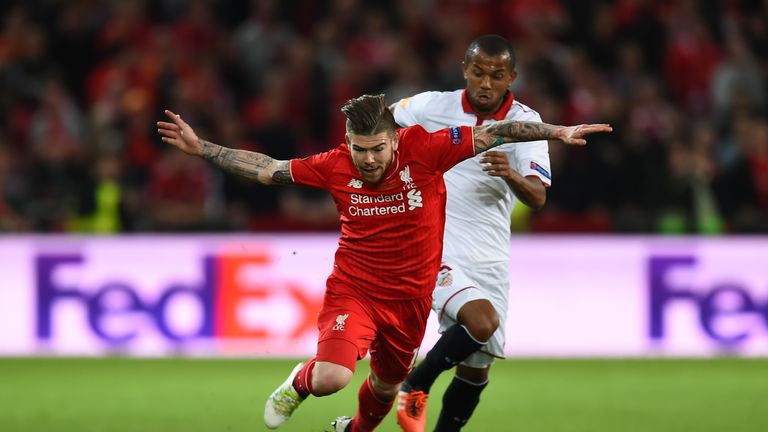 Alberto Moreno of Liverpool is challenged by Mariano of Sevilla during the UEFA Europa League Final match between Liverpool an