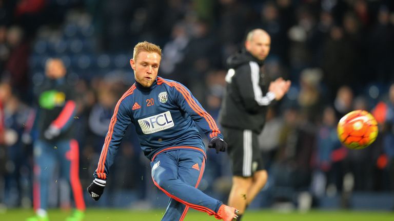 Alex Pritchard warms up with West Brom