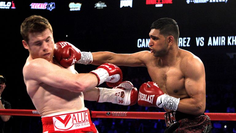 Saul Canelo Alvarez on the receiving end against Amir Khan during their WBC Middleweight Championship fight