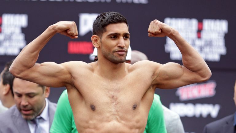Amir Khan poses during the weigh-in on May 6, 2016 in Las Vegas