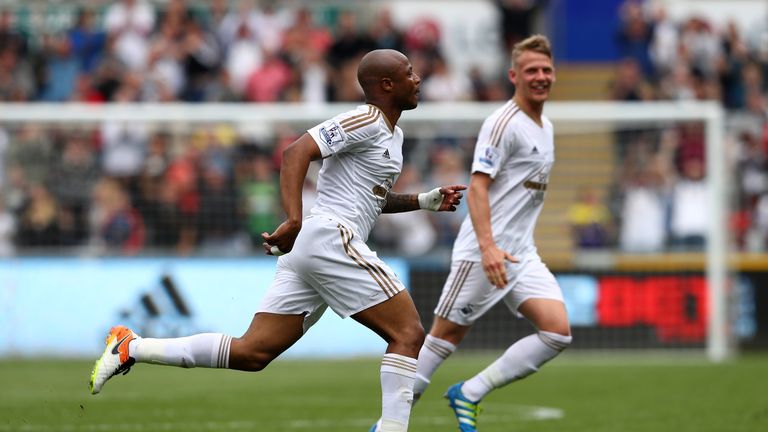 Andre Ayew celebrates after scoring for Swansea against Manchester City