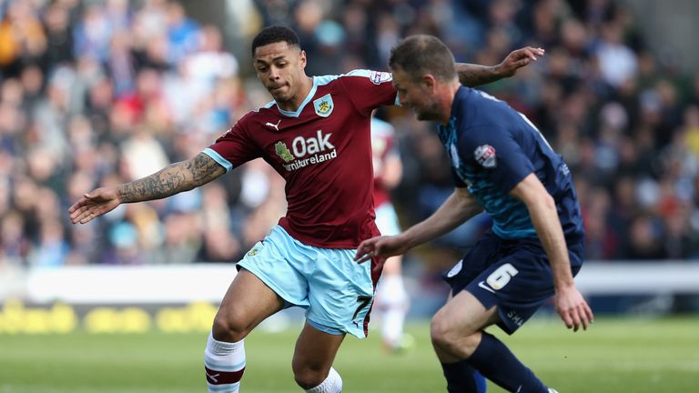 Andre Gray of Burnley takes on Clint Hill of QPR during the Championship match at Turf Moor