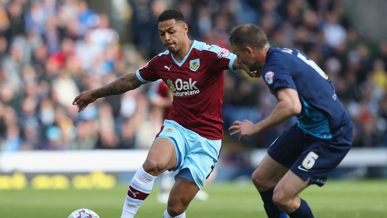 BURNLEY, UNITED KINGDOM - MAY 02:  Andre Gray of Burnley takes on Clint Hill of QPR during the Sky Bet 