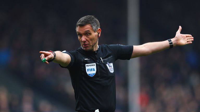 LONDON, ENGLAND - MARCH 06:  Referee Andre Marriner points during the Barclays Premier League match between Crystal Palace and Liverpool at Selhurst Park o