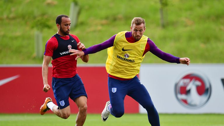 Harry Kane (right) is challenged by Andros Townsend during the England training session at St Georges Park on May 18 2016