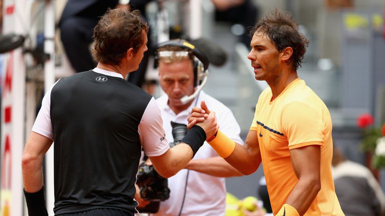 MADRID, SPAIN - MAY 07:  Andy Murray of Great Britain shakes hands at the net after his straight sets victory against Rafael Nadal of Spain in their semi f