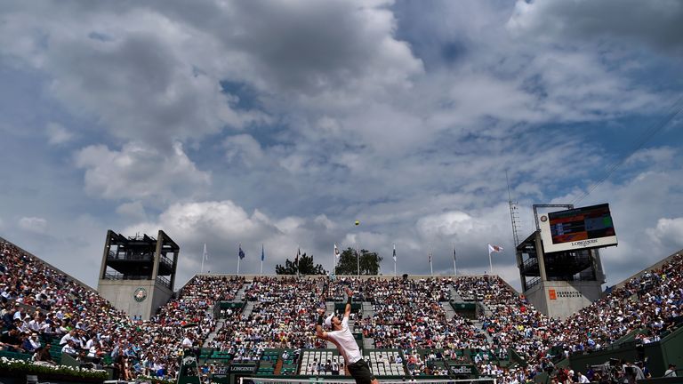 Andy Murray serves against Ivo Karlovic at the French Open
