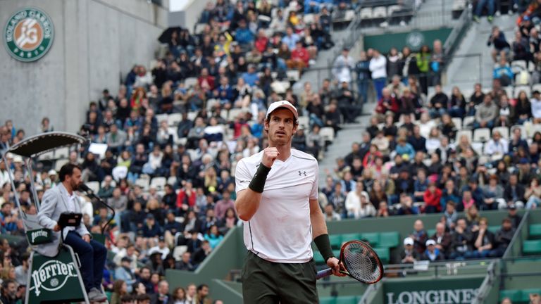 Andy Murray had to battle a big serve and the weather