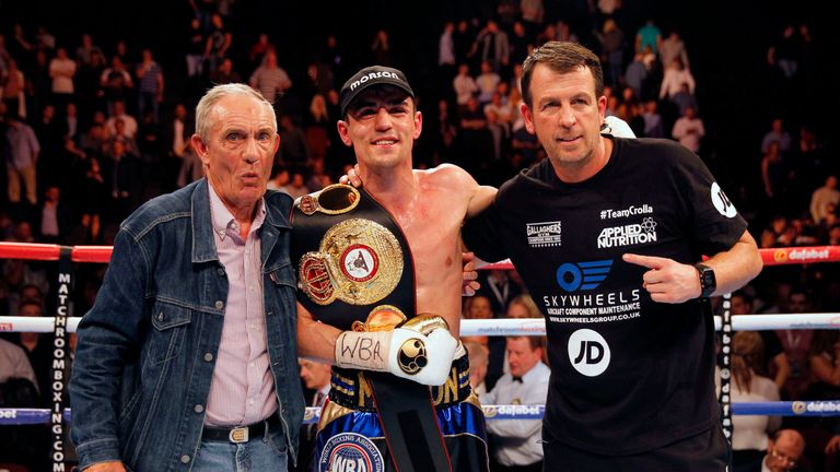 Anthony Crolla celebrates with trainer Joe Gallagher (right) after beating Ismael Barroso