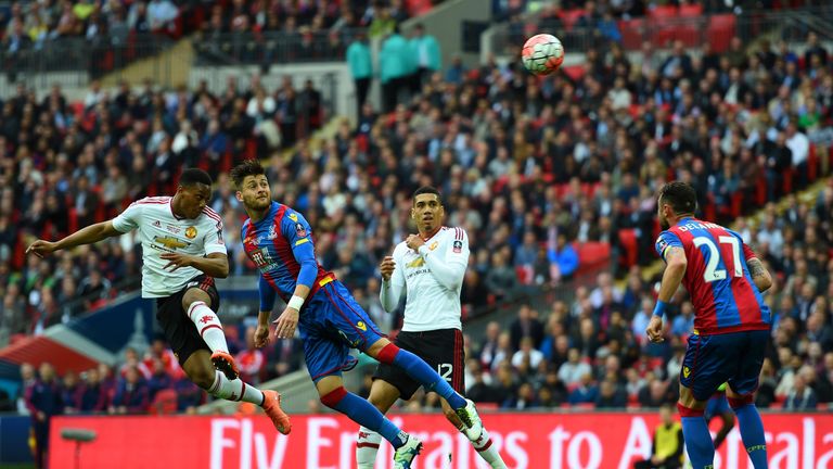 Anthony Martial of Manchester United beats Joel Ward of Crystal Palace