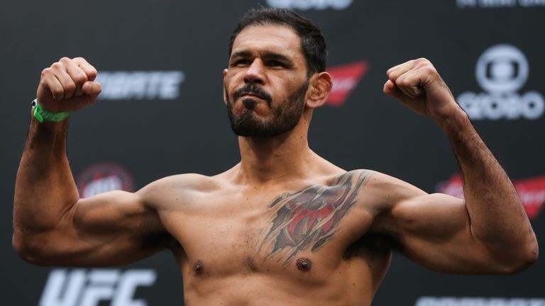 Antonio Rogerio Nogueira of Brazil steps on the scale during the UFC 198 weigh-in at Arena da Baixada stadium on May 13, 2016 i