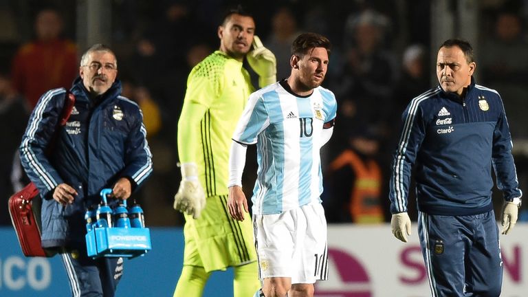 Argentina's forward Lionel Messi goes off with a back injury during the friendly clash with Honduras