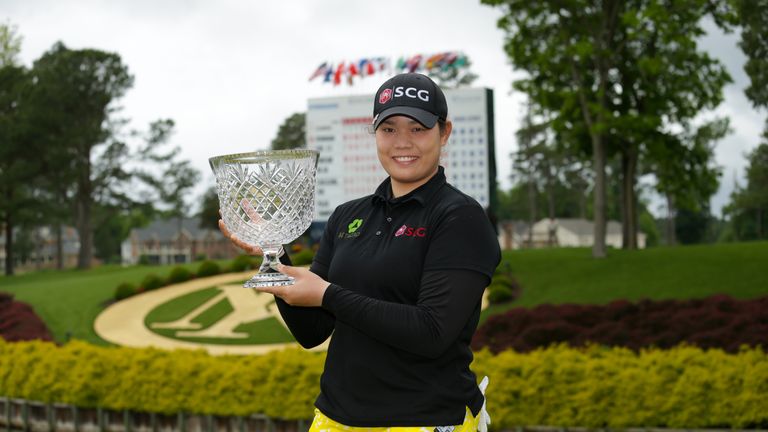 WILLIAMSBURG, VA - MAY 22: Ariya Jutanugarn of Thailand holds the championship trophy after winning the Kingsmill Championship presented by JTBC on the Riv