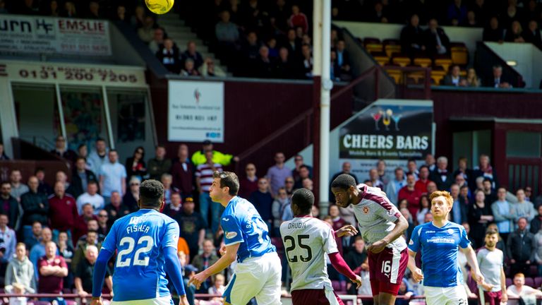 Arnaud Djoum (16) pulls a goal back for Hearts against St Johnstone