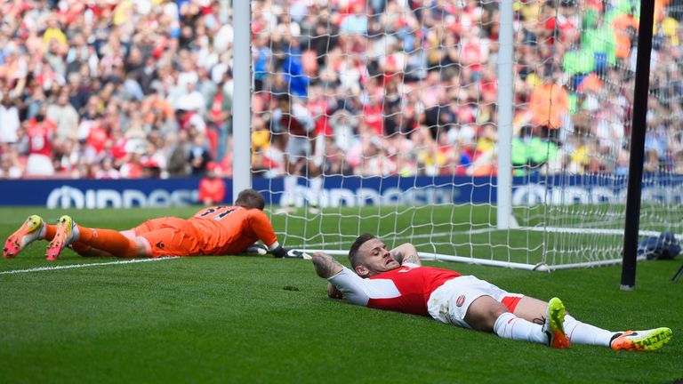 LONDON, UNITED KINGDOM - MAY 15:  Jack Wilshere of Arsenal reacts after missing a chance during the Barclays Premier League match between Arsenal and Aston