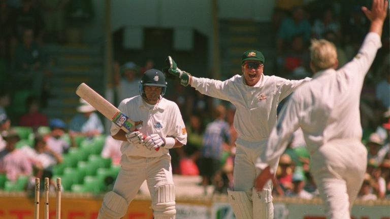 MARK RAMPRAKASH OF ENGLAND IS BOWLED BY  SHANE WARNE OF AUSTRALIA AS WICKETKEEPER IAN HEALY CELEBRATES