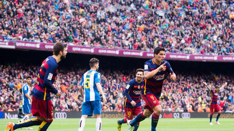 Luis Suarez celebrates Barca's third goal against Espanyol