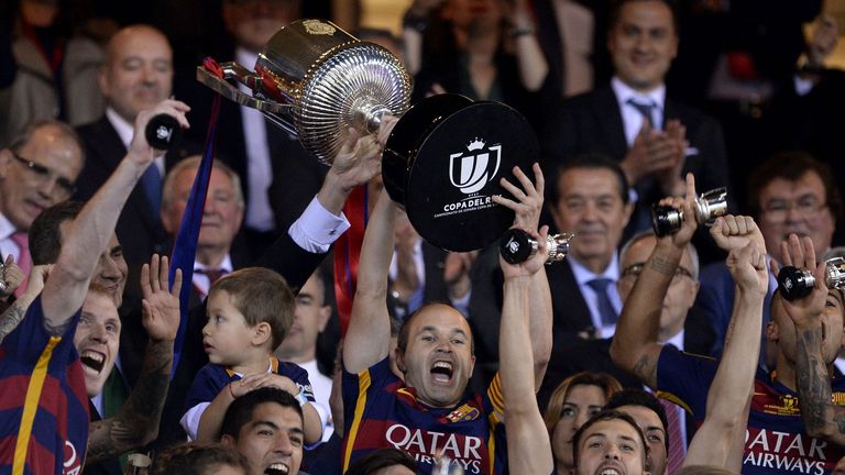Barcelona lift the Copa del Rey after their final victory over Sevilla