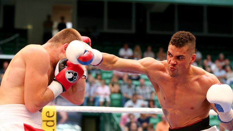 Anthony Ogogo (right) exchanges punches with Ruslan Schelev of Ukraine on July 18, 2015 in Halle, Germany.