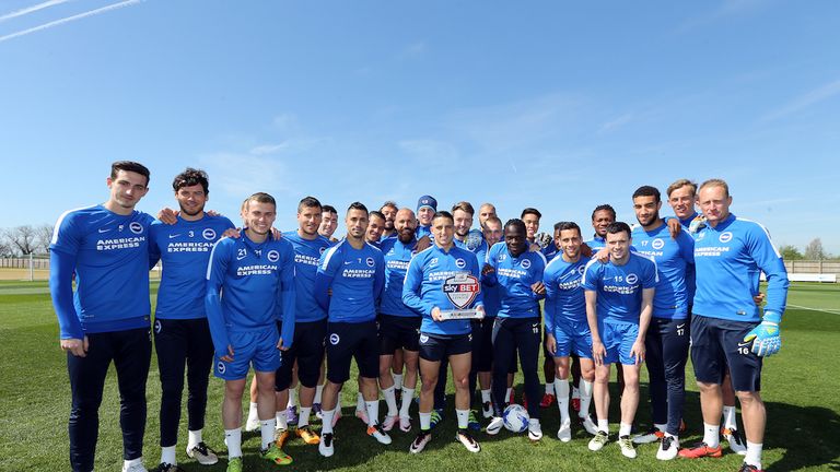 Anthony Knockaert celebrates his Player of the Month award with his Brighton team-mates
