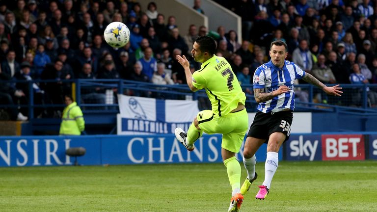 Sheffield Wednesday's Ross Wallace scores the opening goal against Brighton