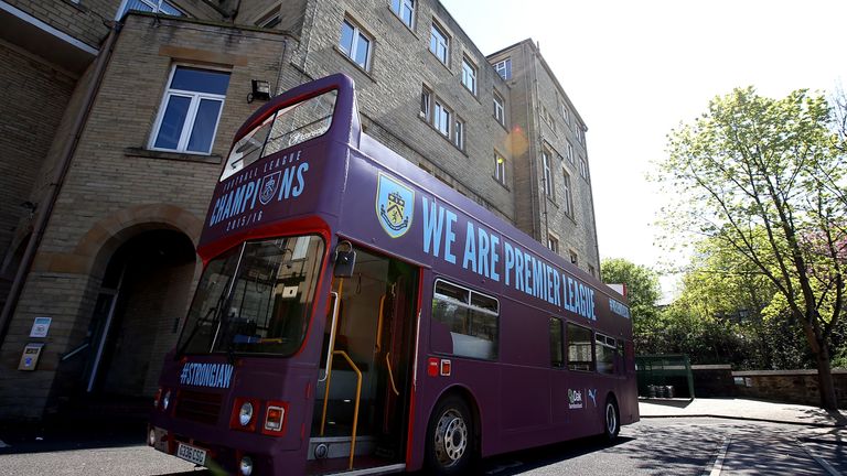 BURNLEY, ENGLAND - MAY 09:  The champions bus waits outside the Town Hall during the Burnley Sky Bet Champions Winners Bus Parade on May 09, 2016 in Burnle