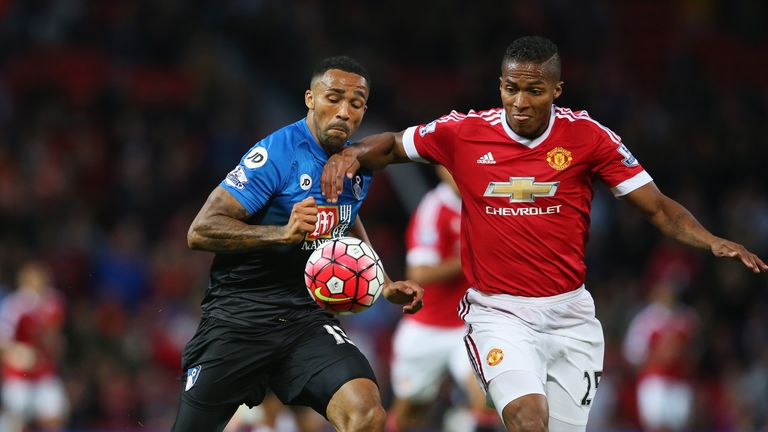 Callum Wilson (left) was on duty for Bournemouth at Old Trafford on Tuesday night