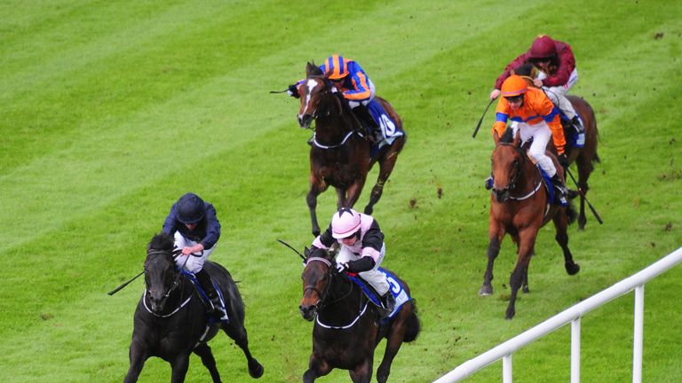 Caravaggio (left), ridden by Ryan Moore, wins the Cold Move EBF Marble Hill Stakes