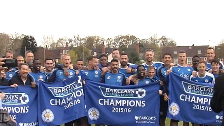 Leicester City players with banners at training ground