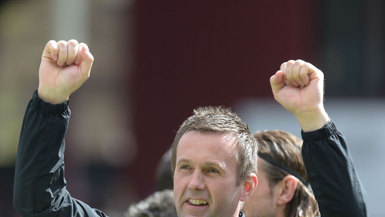 Celtic manager Ronny Deila celebrates after the win at Hearts