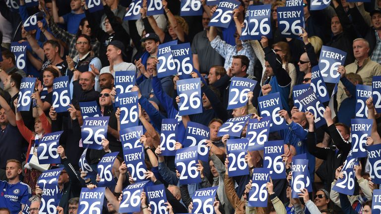 Chelsea fans hold 'Terry 26' banners to show their support to John Terry during the match against Leicester