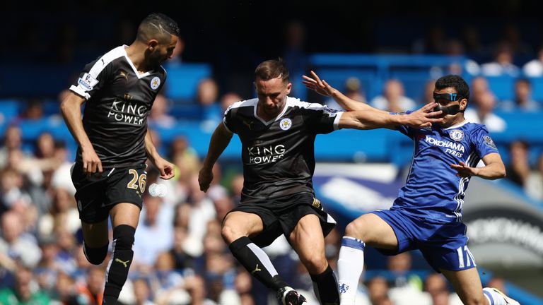LONDON, ENGLAND - MAY 15: Danny Drinkwater of Leicester City and Pedro of Chelsea compete for the ball during the Barclays Premier League match between Che