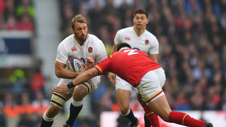 LONDON, ENGLAND - MARCH 12:  Chris Robshaw of England is tackled by Scott Baldwin of Wales during the RBS Six Nations match between England and Wales at Tw