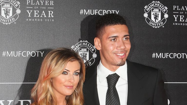 Chris Smalling of Manchester United arrives with his partner at the club's annual Player of the Year awards