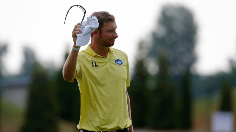 ATZENBRUGG, AUSTRIA - JUNE 14: Chris Wood of England gestures as he leaves the 18th hole during the Lyoness Open day four at the Diamond Country Club on Ju