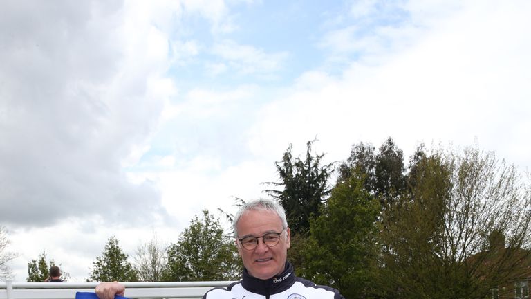 Leicester City manager Claudio Ranieri celebrates winning the Premier League title during a session at the Belvoir Drive training ground