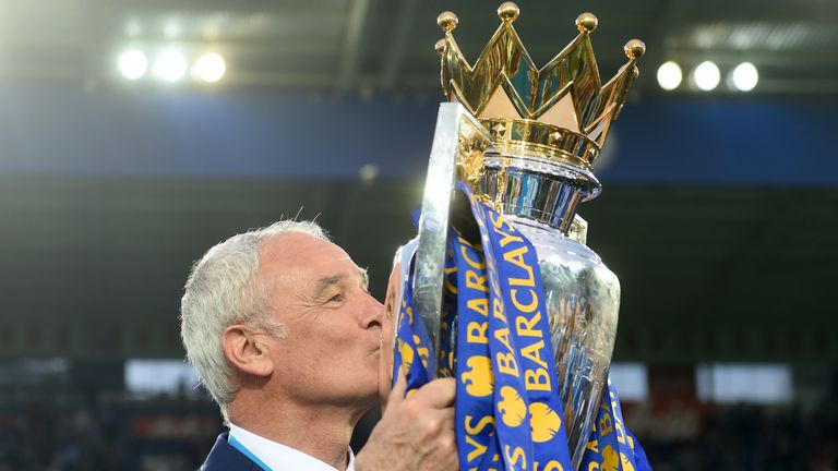 LEICESTER, ENGLAND - MAY 07:  Claudio Ranieri Manager of Leicester City kisses the Premier League Trophy after the Barclays Premier League match between Le