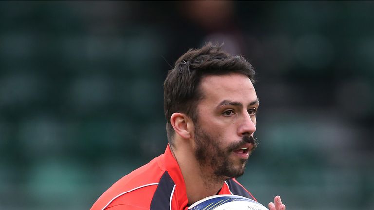 Toulouse's French full back Clement Poitrenaud catches the ball during warm up 