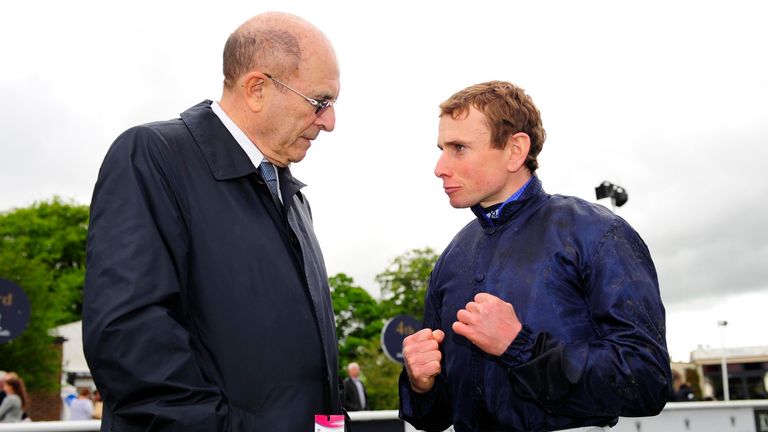 Jockey Ryan Moore with owner Michael Tabor after riding Caravaggio to victory at the Curragh